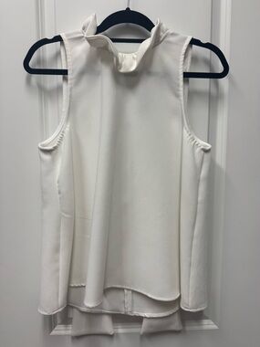 Pomander Place White Ruffle Neck Sleeveless Blouse